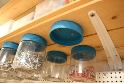 peanut butter jars under shelf