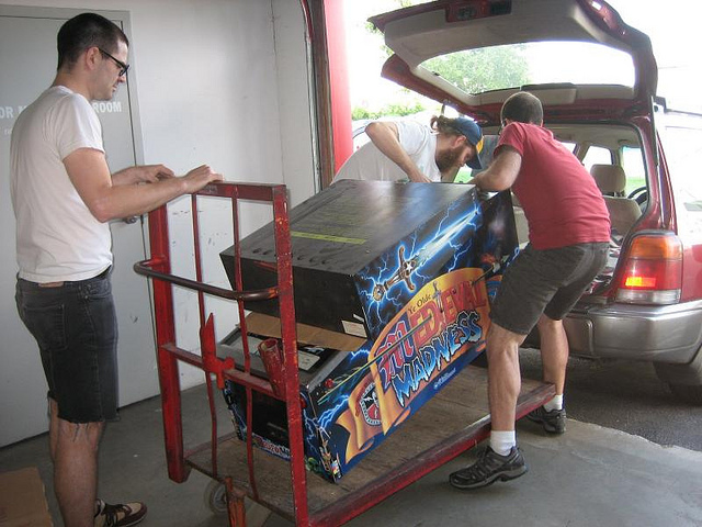 pinball machine on dolly