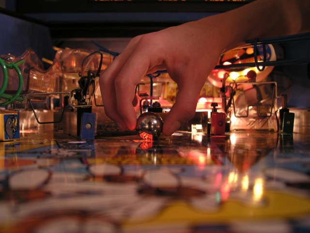 cleaning a pinball machine