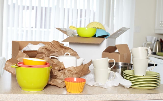 open boxes with kitchen supplies