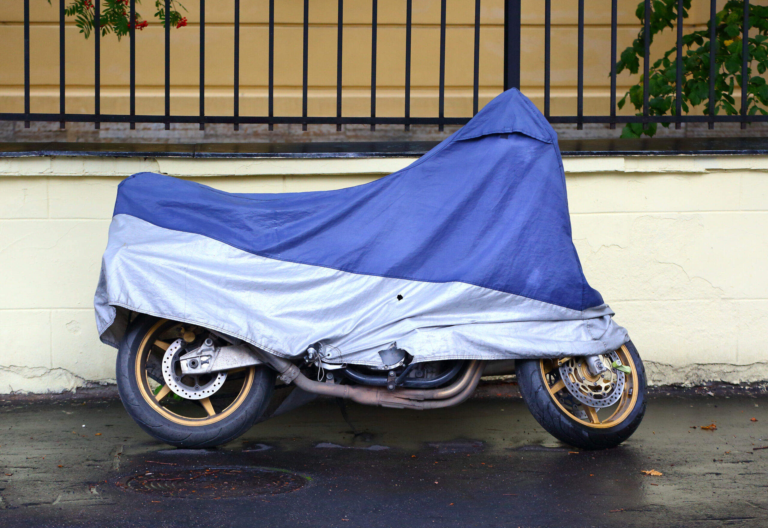A parked and covered motorcycle