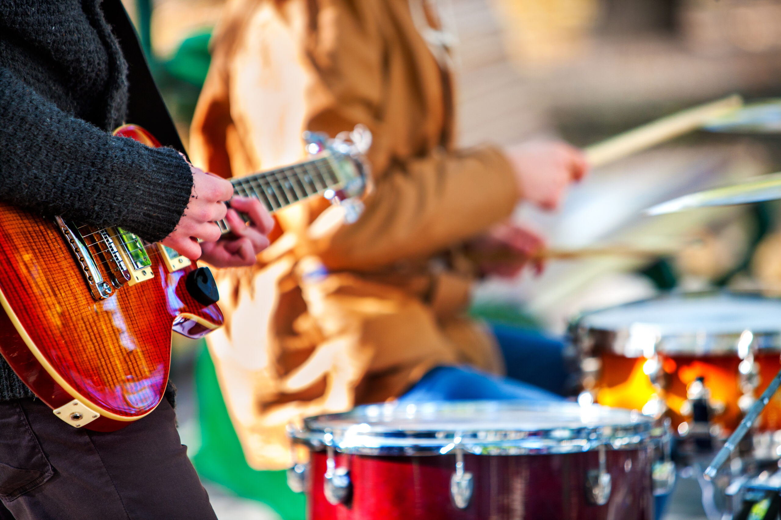 a band practicing in a park