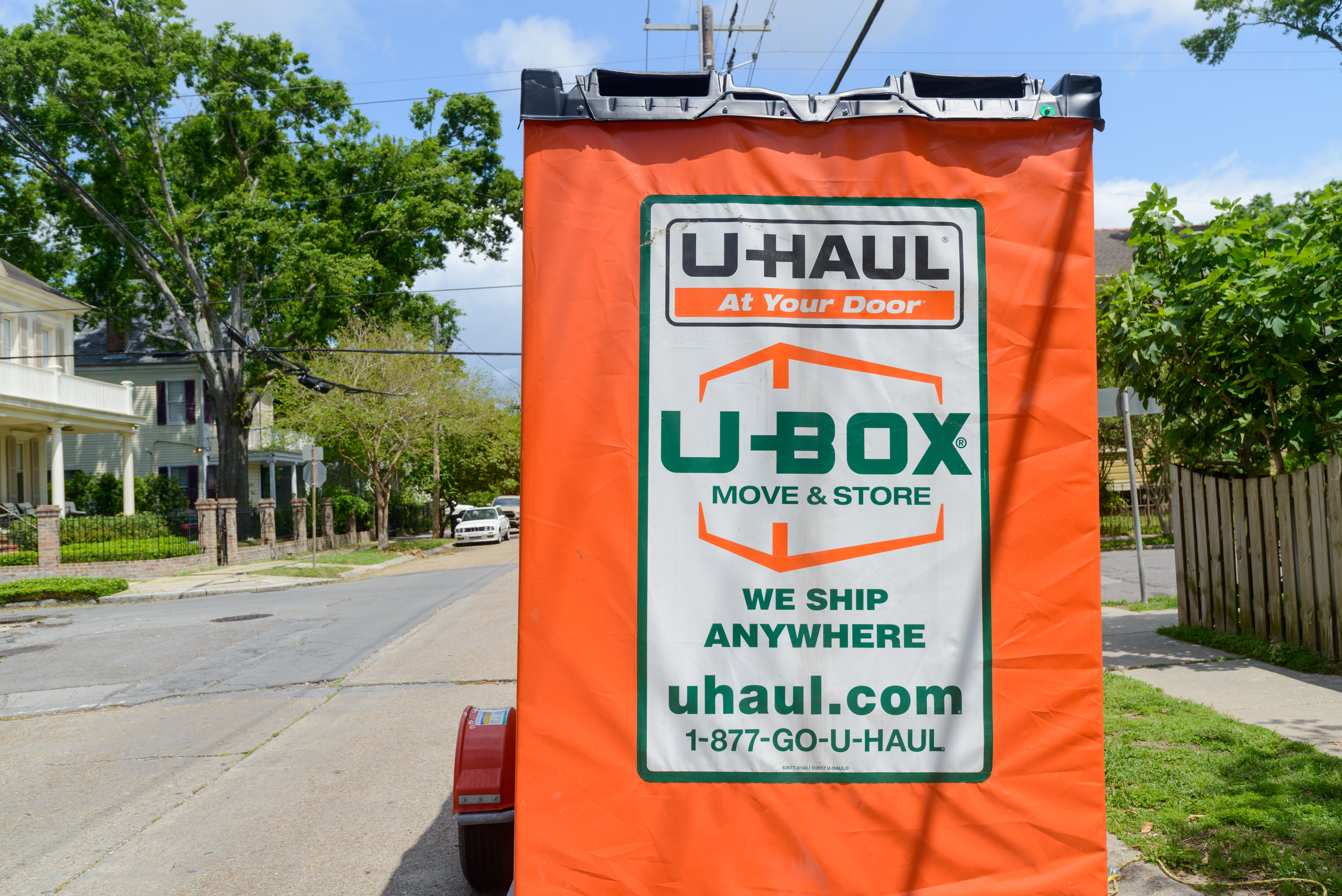 An U-Haul U-box parked on the street